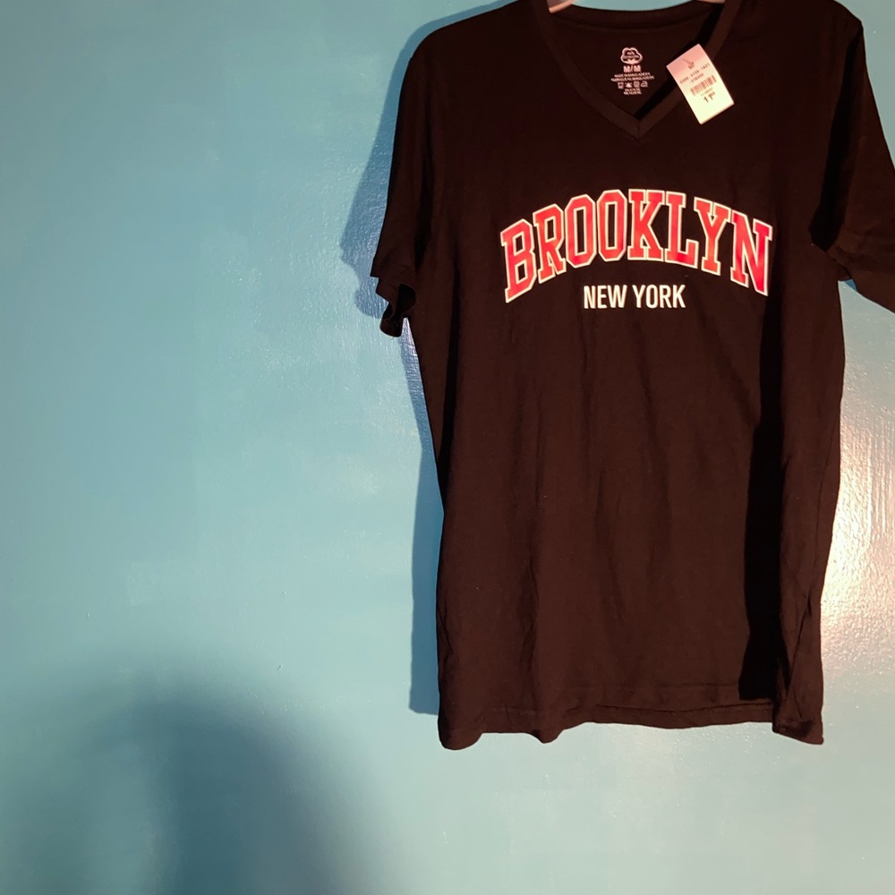 Black tee by Charlotte Russe. Never worn.